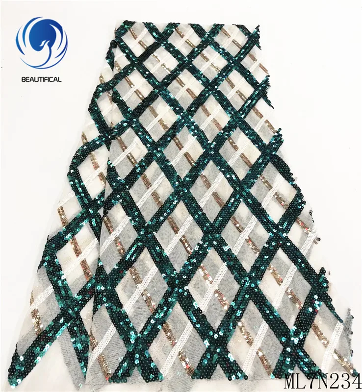 

BEAUTIFICAL nigerian lace fabrics Fashion design african tulle lace fabric with sequins for dress net lace fabric ML7N234