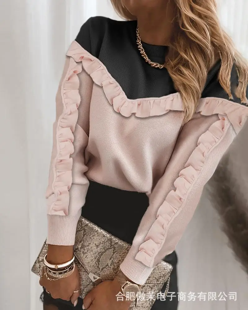 

The new women's clothing contrast color wood ear round neck blouse