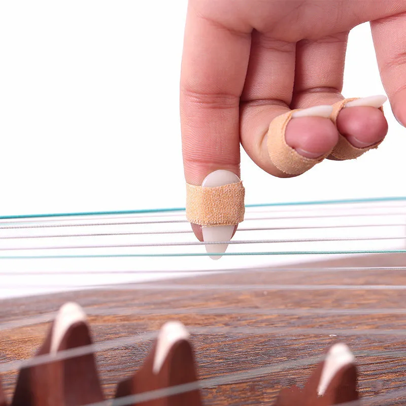 

8pcs Guzheng Nail Set Chinese Zither A Box of Eight Guzheng Accessories Guzheng Practice Nails with Box for Adults and Children
