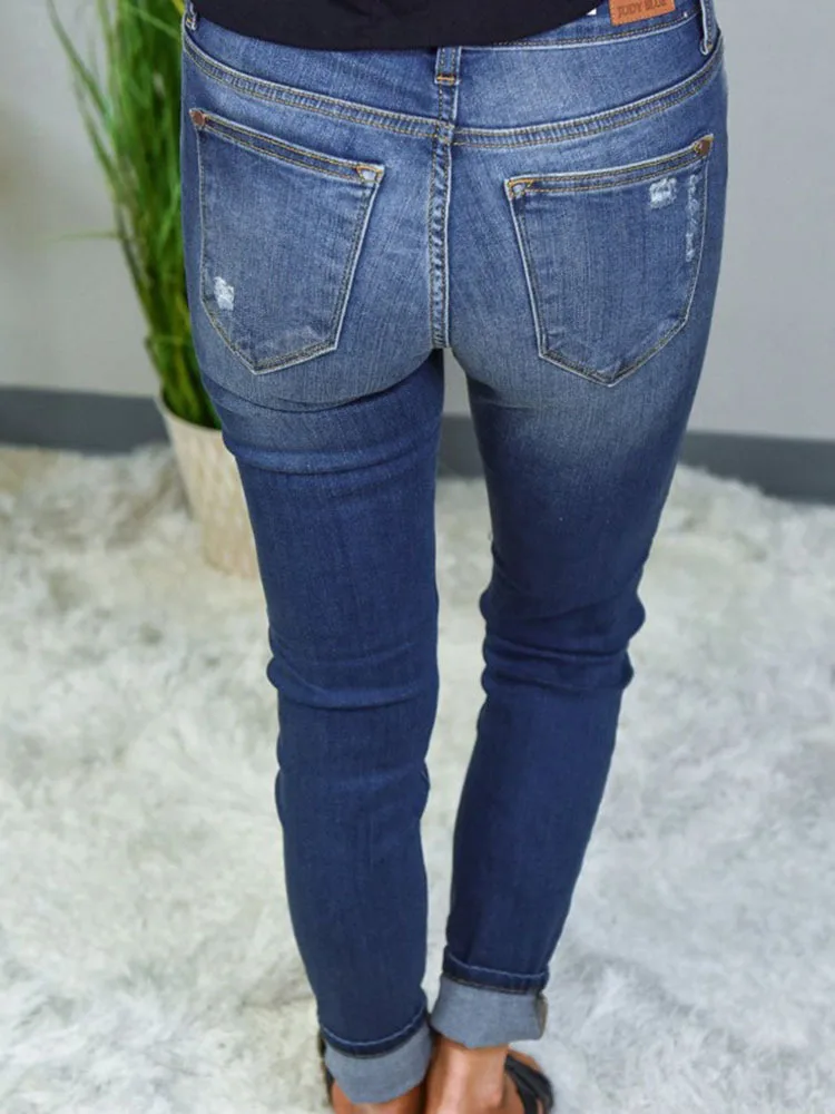 

Cross-border sources of foreign trade in Europe and the United States large size broken hole stretch small foot jeans female