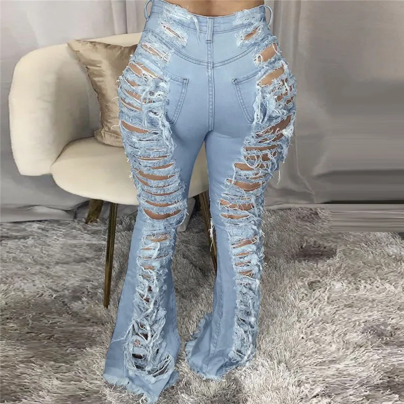 

Plus Size S-3XL Sexy Nightclub Women Ripped Jeans Blue Black Hollow Out Tassels Plus Size High Elastic Denim Flared Pants Indie