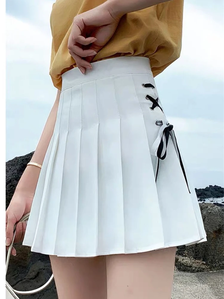 

2021 Women Korean Harajuku Bow Tie Cute Punk Funny Vintage Pleated Skirt High Waist Straps Female Cute Japanese Kawaii Skirts