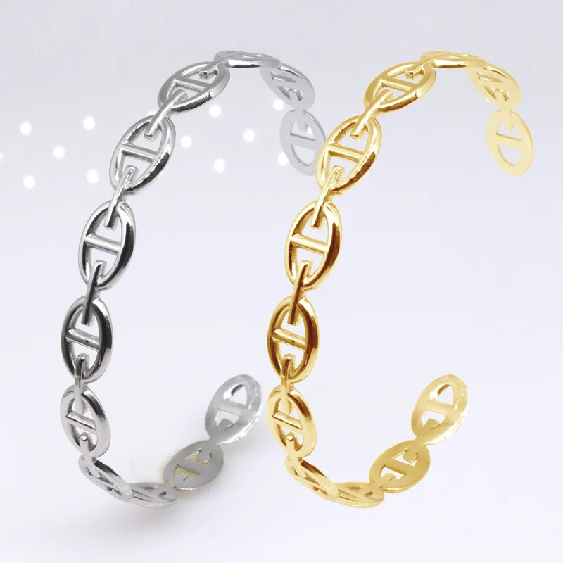 

Stainless steel couple bracelet titanium steel bracelet c-shaped titanium steel bracelet retro hollow jewelry wholesale jewelrys