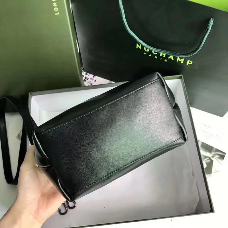 

New mini lambskin portable messenger dumpling bag female mini lambskin dragon cheek bag with box dust bag
