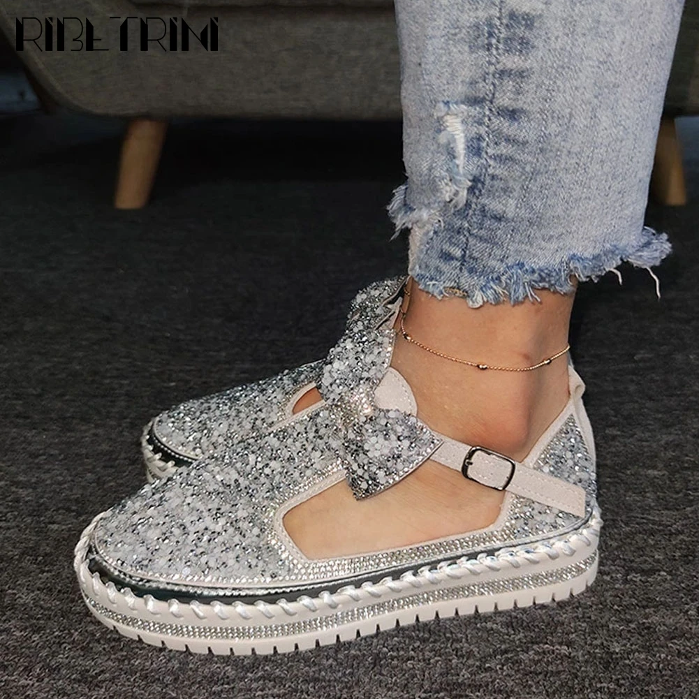 

RIBETRINI Female Butterfly Knot Slip On Shoes Fashion Bling Women Sandals 2020 Rhinestone Casual Daily Sewing Sandals