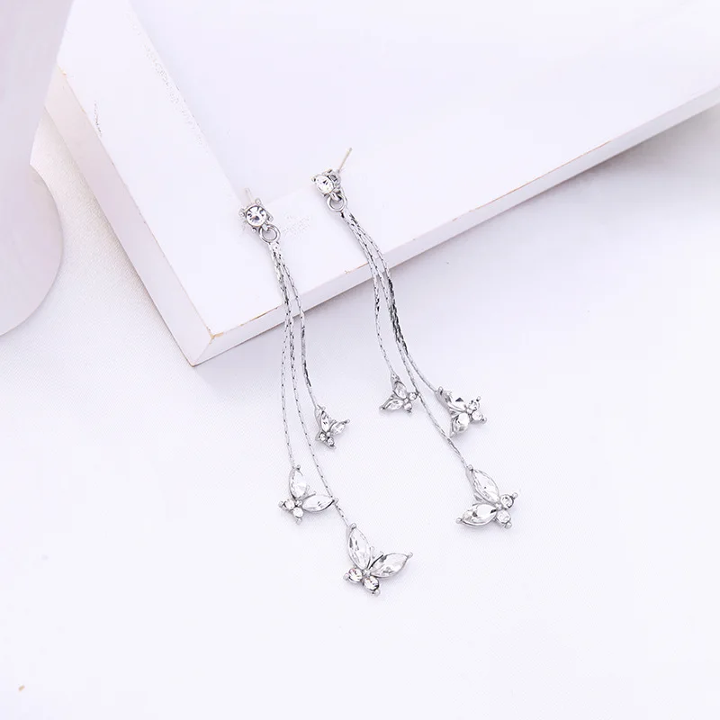 Korean version of the cold wind butterfly earrings fashion niche flowers long paragraph super fairy temperament earring | Украшения и