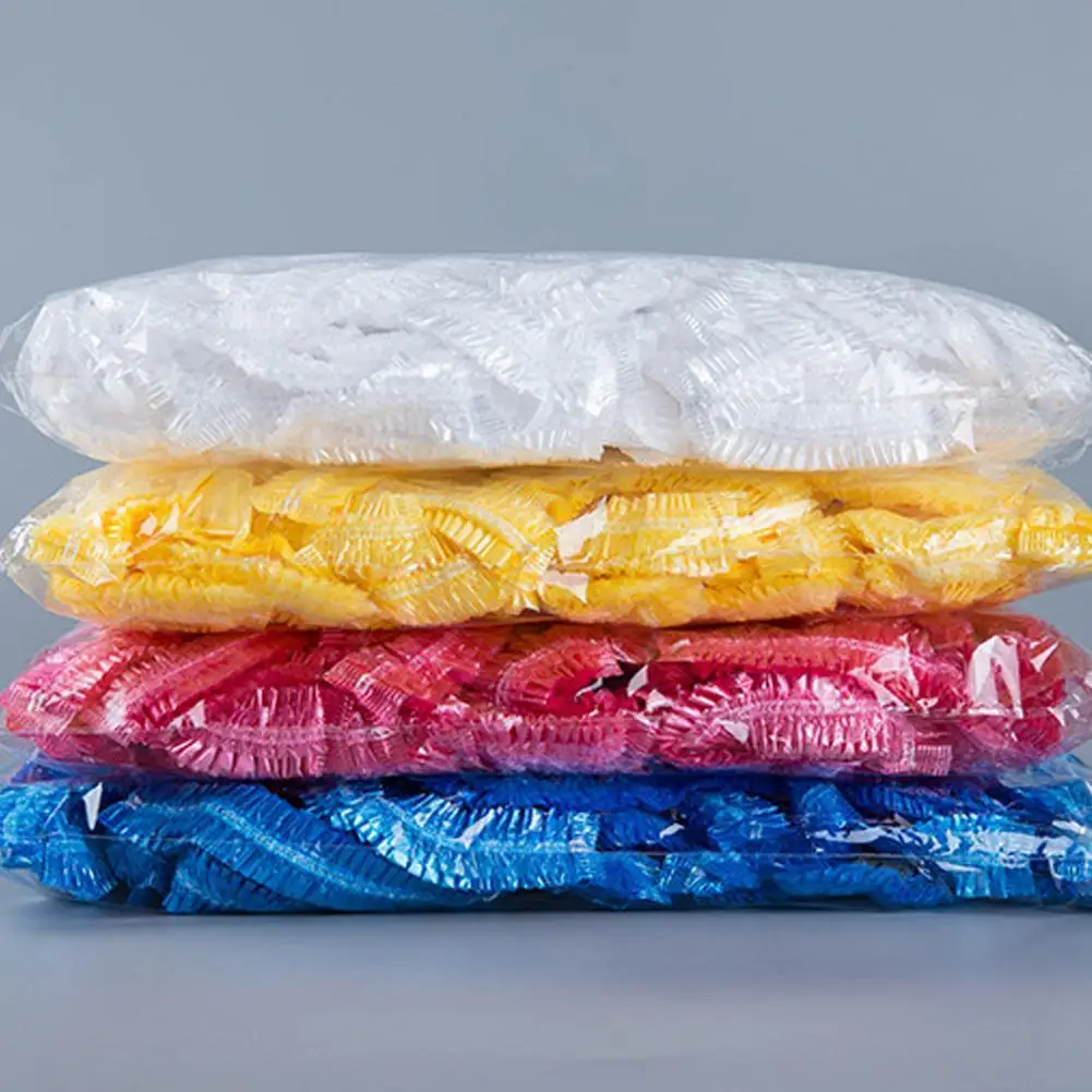 

100Pcs PE Disposable Waterproof Color Shower Cap Bathing Hair Protective Cap Salon Headgear Hat Protective Cap