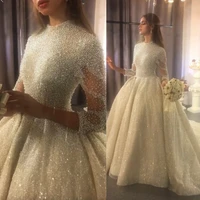 charming pearls heavy beading wedding dresses long sleeves sparkly lace sequined sparkly sweep train bridal gowns saudi arabic