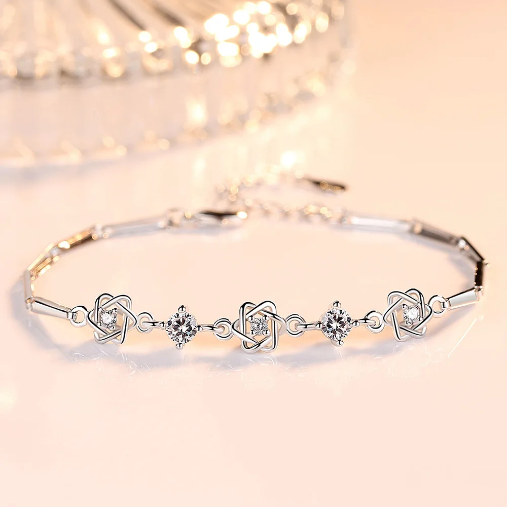 Браслет из серебра пробы с фиолетовыми и прозрачными звездами Давида браслет для