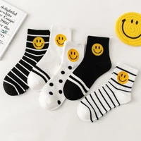 5 pairs black and white smiley face breathable mid calf female cotton socks