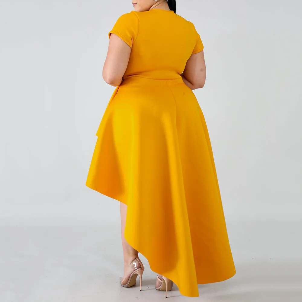 Женское платье большого размера розовое асимметричное с низким слоем оборками