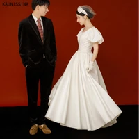 kaunissina simple o neck white wedding dresses short sleeve pleated sexy backless bride dress korean satin a line wedding gowns
