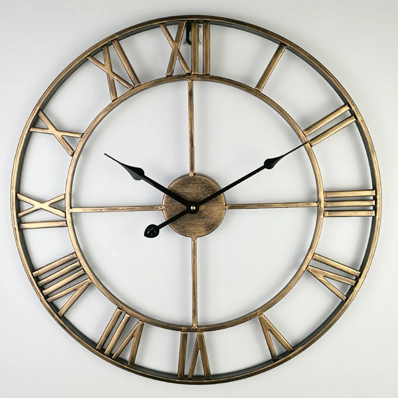 

Living room fashion mute wall clock metal wall clock round hollow iron art