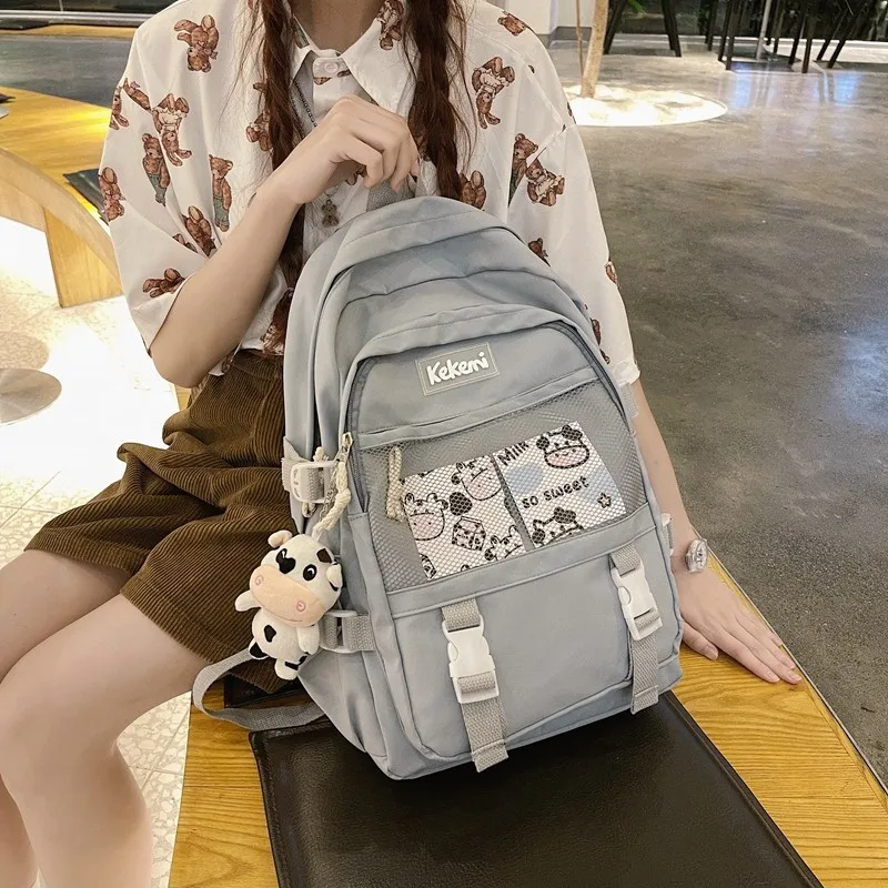 

Cute Cow Doll Women's Backpack All-match Nylon Waterproof Student School Bag Large Capacity Solid Color Travel Backpacks