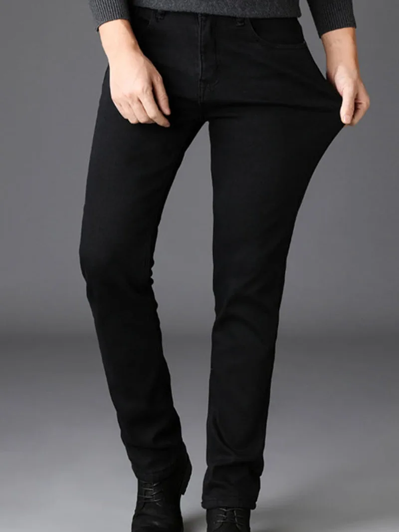 Модные зимние джинсы мужские черные облегающие эластичные плотные бархатные