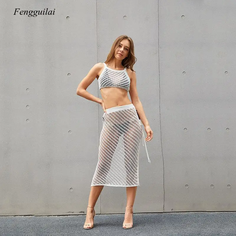 

2021 Summer New Sleeveless Hollow Out Loose Cotton Knitted Two Piece Set Leisure Sexy Holiday Suit for Women