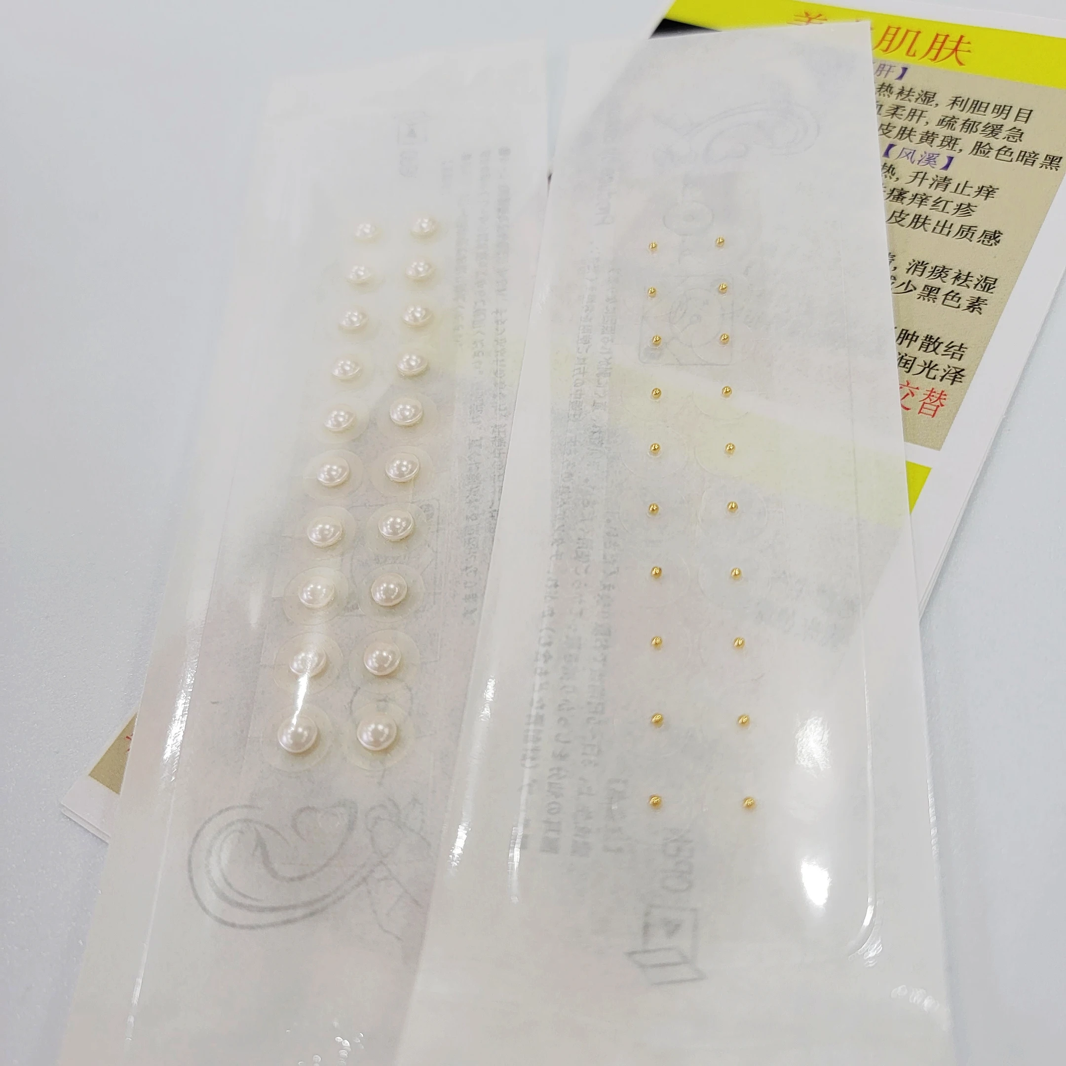 

Семена ушей 24 К золота, жемчуг, кристалл, драгоценный камень, магнитные бусины, прозрачная лента, наклейка для аурикулярной терапии, семена у...