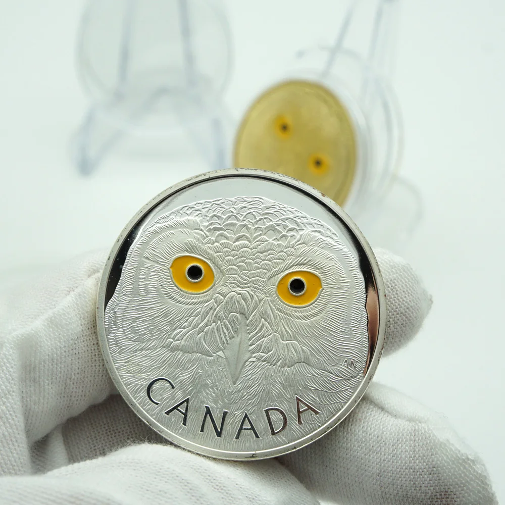 Монета с золотым и серебряным покрытием в виде канадского животного 1 унция -