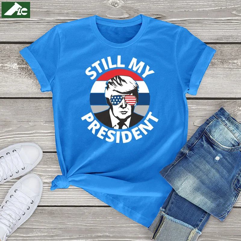 

Donald Trump Is Still My President T Shirt Men Women Clothing Sunglass Anti-Biden Graphic Shirt Vintage Unisex Short Sleeve Tees