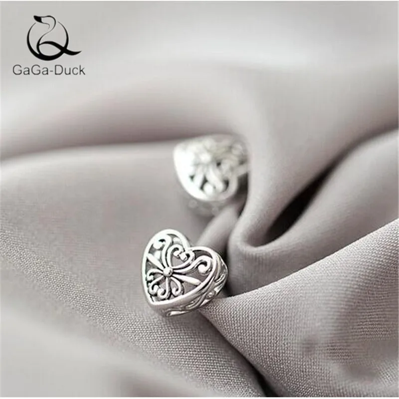 

New Fashion Jewelry Flower 925 Sterling Silver Not Allergic Personality Heart Shaped Hollow Women Exquisite Stud Earrings E009