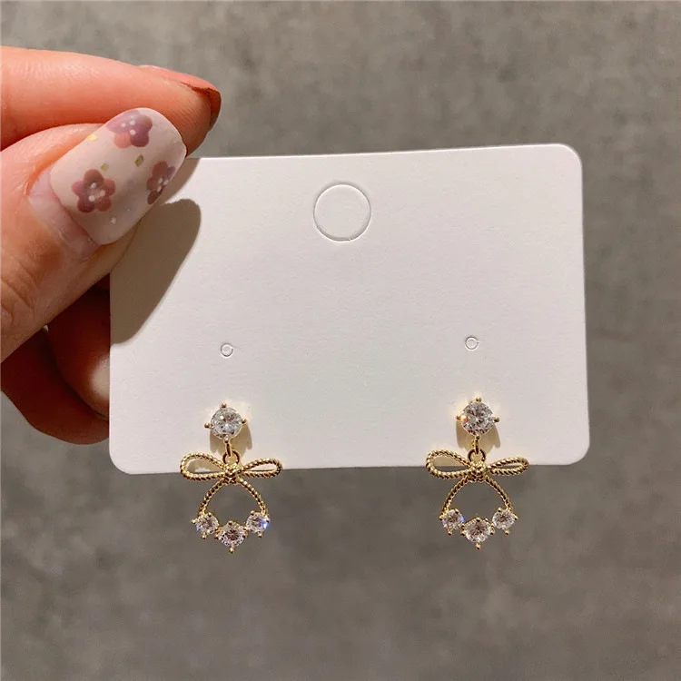 

Avoid Korean fashion allergy personality wick Crystal Bow gout Earrings suitable for women and girls to play jewelry