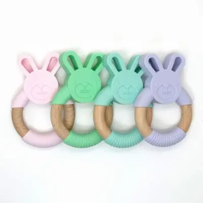 

1pc Baby Toys Silicone Baby Teether Beech Wooden Ring Hand Teething Rattles Musical Chew Play Gym Montessori Stroller