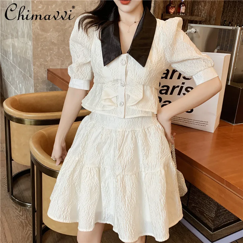 

Elegant Outfit 2021 Summer New White Embossed Puff Sleeve Slimming Top French Socialite Temperament Top+Mini Skirt 2-Piece Set
