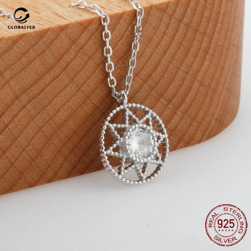 

S925 Sterling silver inlaid zircon hollow round pendant necklace Simple fashion french INS wind necklace Female clavicle 104