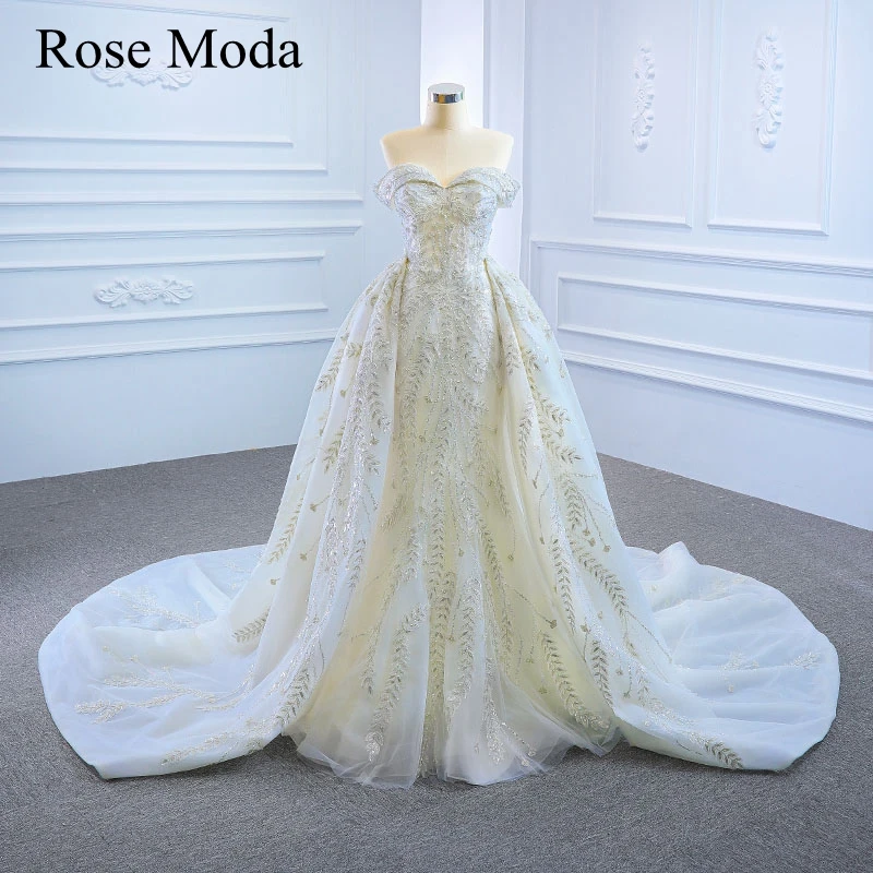 

Роза Moda Роскошные с открытыми плечами в значительной степени платье-русалка, украшенное бусинами свадебное платье со съемной юбкой изготов...
