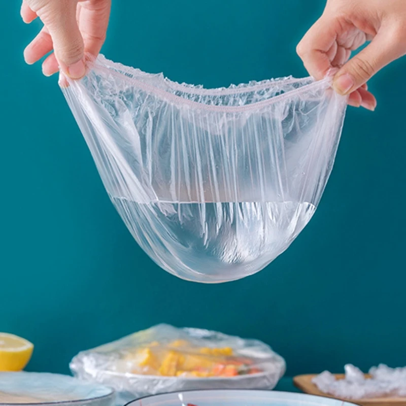 

Новинка 100 шт. пластиковые пакеты Крышка для пищевых продуктов эластичные регулируемые крышки чаши Универсальная кухонная обертка запаянк...
