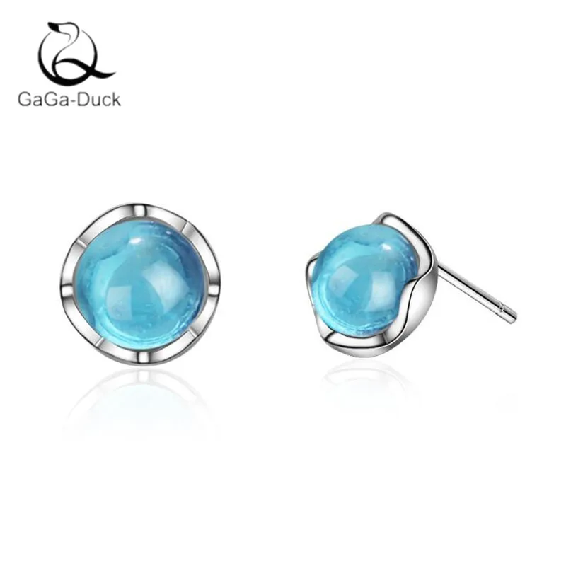 Серьги гвоздики из серебра 952 пробы с искусственным голубым