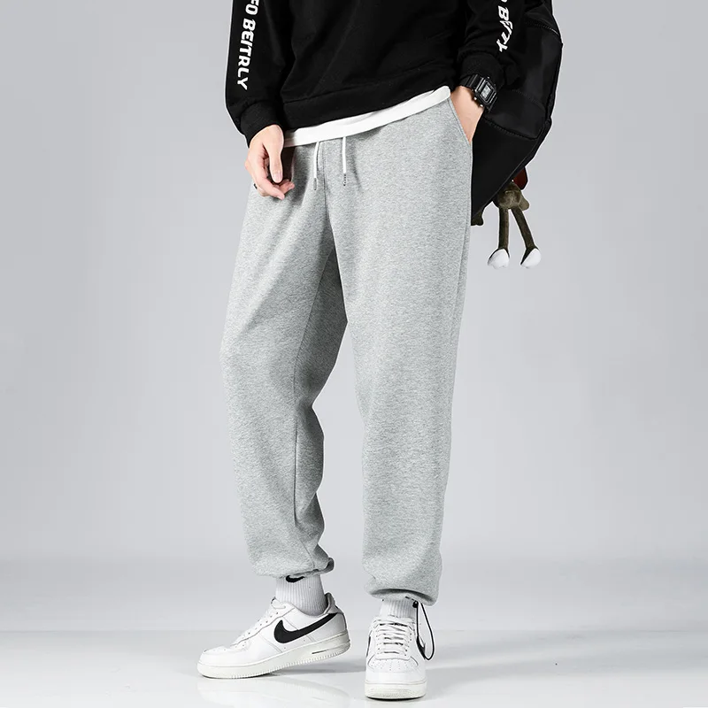 

Новые хлопковые осенне-зимние красивые Молодежные спортивные брюки в Корейском стиле мужские весенние однотонные Модные свободные больши...
