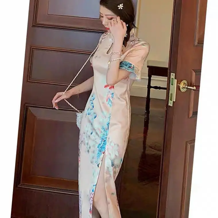 

Cheongsam young girl 2021 new modern wind horn sleeve long slim side split dress