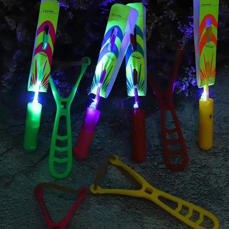 

10 Sets Outdoor Shining Rocket Flash LED Light Night Kids Luminous Slingshot Toy Shine Slingshot Elastic Helicopter Rotating Toy