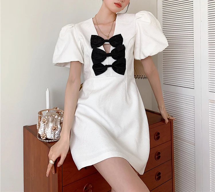 

Vintage Luxury Short Sleeve Chic Hollow Out Bows Dress Women Fashion Deep V Neck Sexy Party Dresses For Women Vestidos SL044