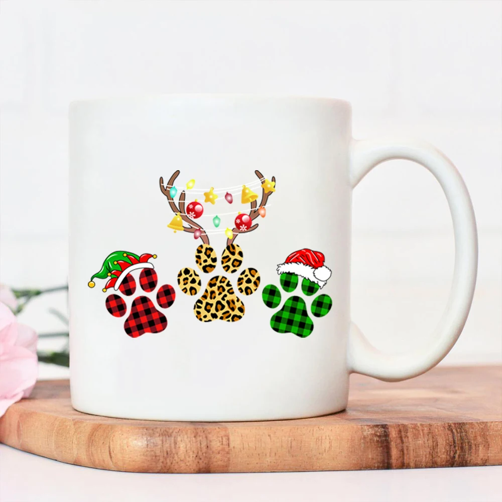 

Новая стильная чашка для воды для женщин Счастливого Рождества, кофейная чашка с принтом кошачьих лап и лося, многоразовые керамические пра...