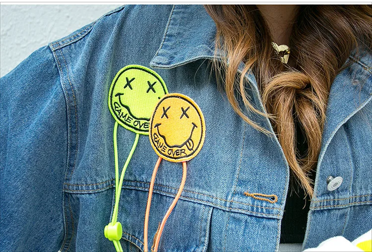 

Ripped and distressed raw-edged denim jacket women' mid-length autumn stitching plus size personalized smiley denim jacket trend