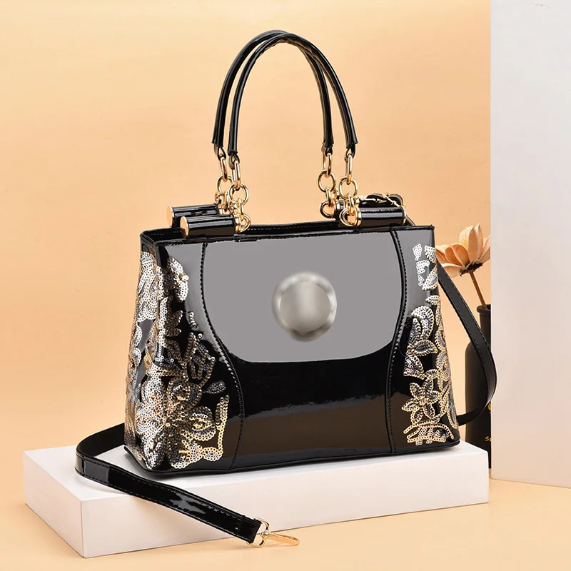 

2021 spring handbag large capacity bright leather double-sided embroidered women's atmospheric Single Shoulder