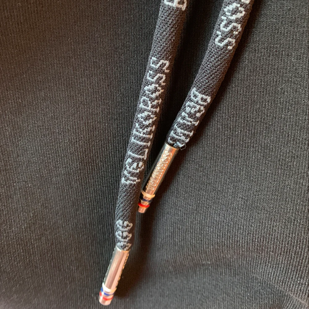 Спортивные штаны Великоросс черного цвета жаккардовые лампасы и брендовые