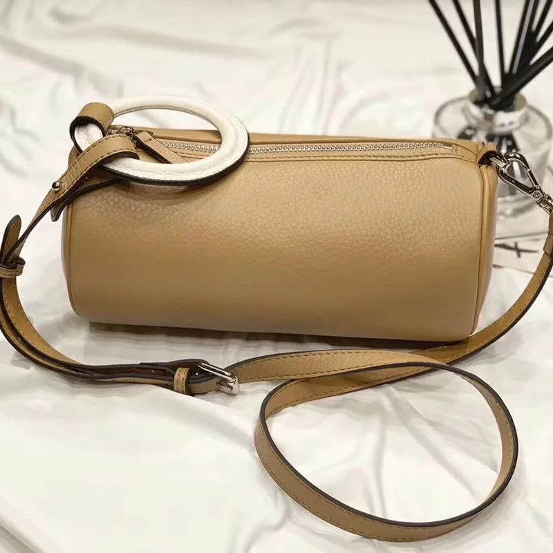 

Cowhide niche design bag cylindrical small satchel cylindrical messenger bag fashion simple versatile women's bag