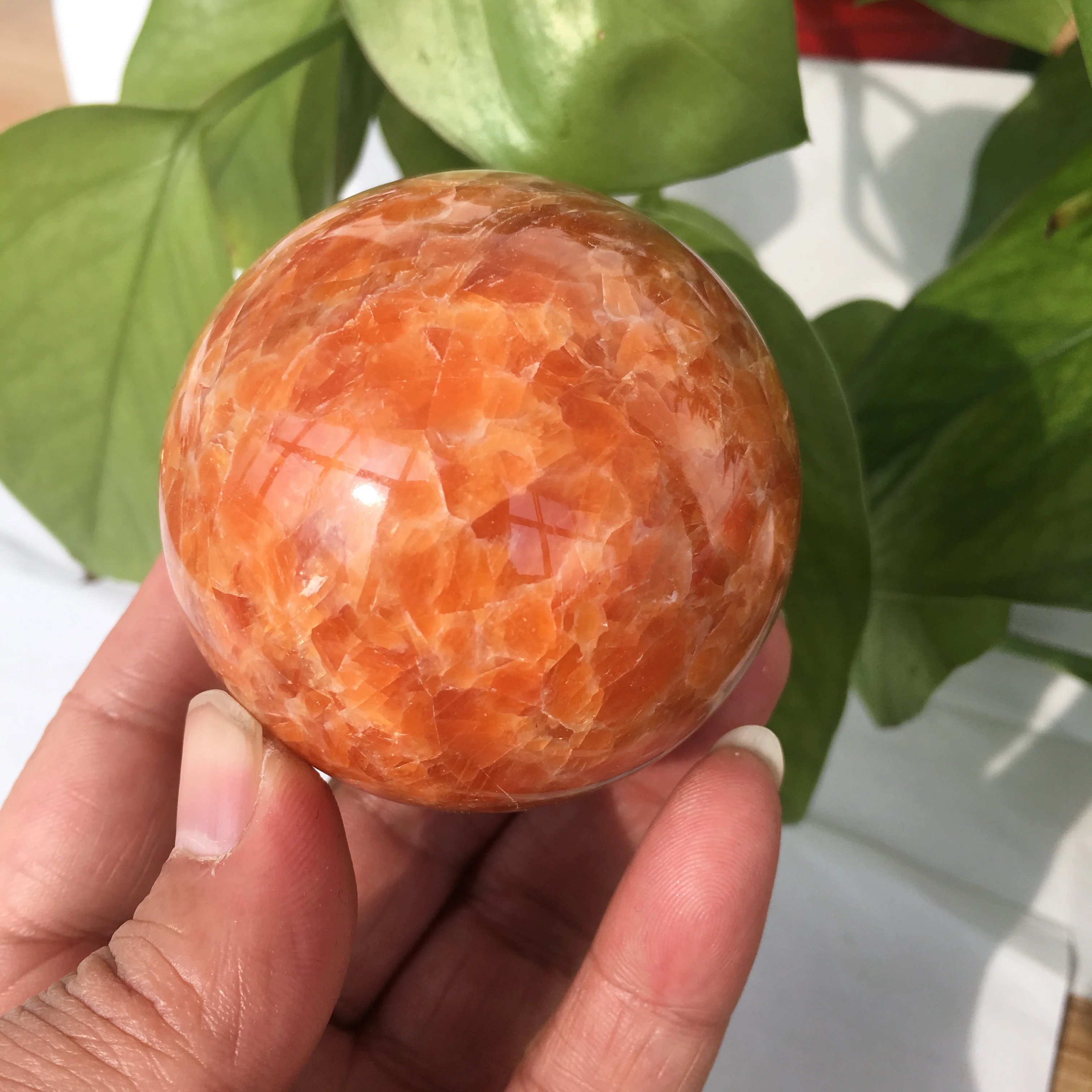 

Natural sunstone ball crystal ball polishing healing energy stone decoration