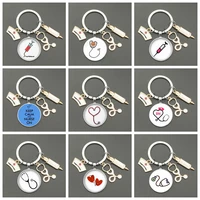 doctor and nurse glass keychain stethoscope syringe dripping oil alloy medical bag male and female keychain charm love gift