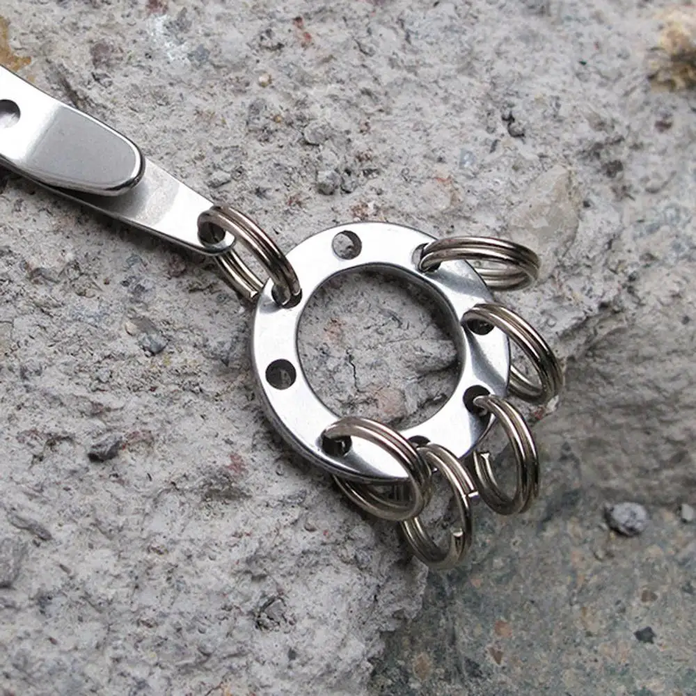 

1Pcs EDC Portable Mini 8 Hole EDC Keychain Pocket Multi Tool Keychain Outdoor Camping Key Ring with 8 Mini Steel Rings