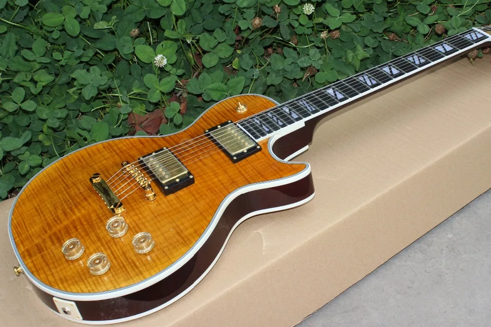 

Custom electric guitar.yellow color tiger flame top guitarra. Rosewood fingerboard gitaar.Real photos