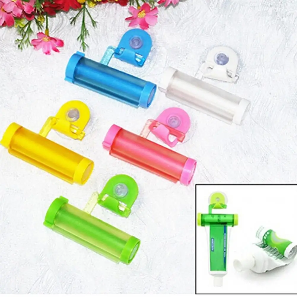 

Cute Rolling Squeezer Toothpaste Dispenser Tube Partner Sucker Hanging Holder