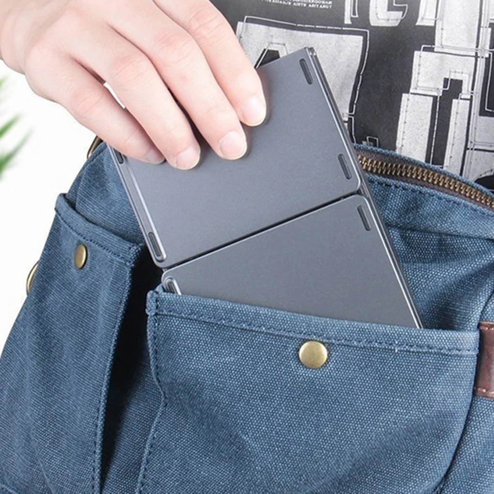 

Hot Selling Mini Bluetooth USB Charging Keyboard Touchpad Wireless Foldable Slim Keypad PC Tablet Laptop