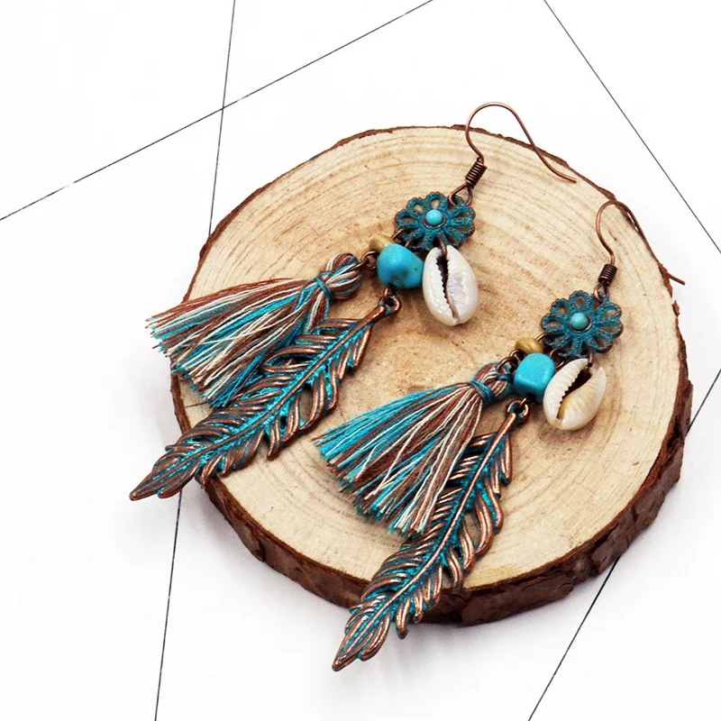 Синие серьги гвоздики с кисточками цветами перьями ракушками подвесками птицами