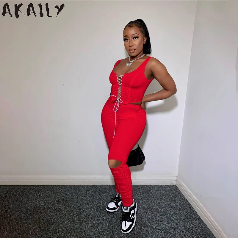 

Уличная одежда Akaily, черный бандажный укороченный топ без рукавов, комплекты с длинными брюками, женские белые облегающие комплекты из 2 пред...