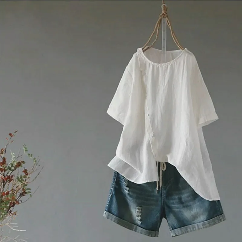 2019 summer new large size cotton and linen women's short-sleeved O-neck button irregular hem blouse |