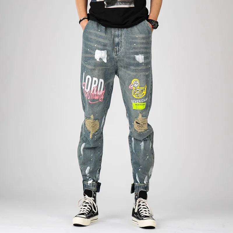 

Мужские рваные джинсы MORUANCLE, модные Джоггеры в стиле хип-хоп, уличные джинсовые брюки с принтом, рваные джинсы с эластичным поясом